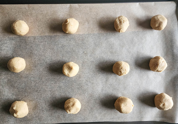 Butter cookies rolled and on baking sheet