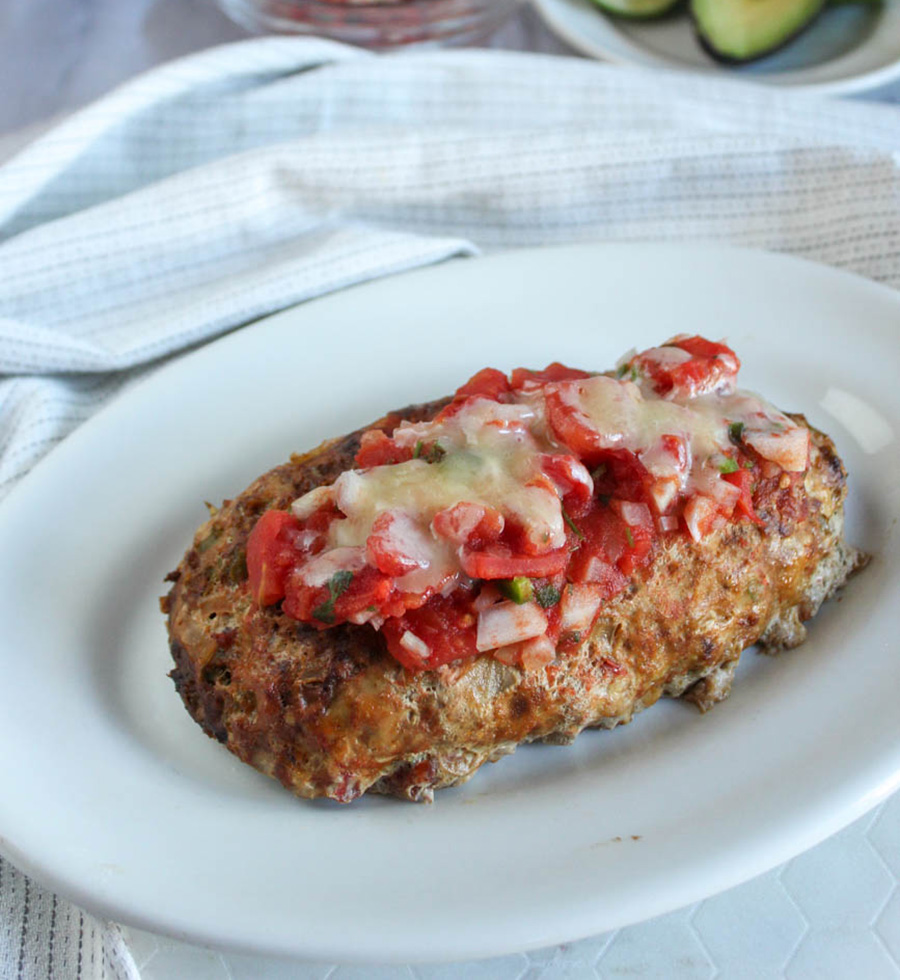 Final process shot cooked meatloaf with cheese on top