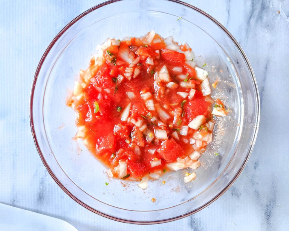 process step 2 for slow cooker turkey meatloaf - salsa ingredients in a bowl