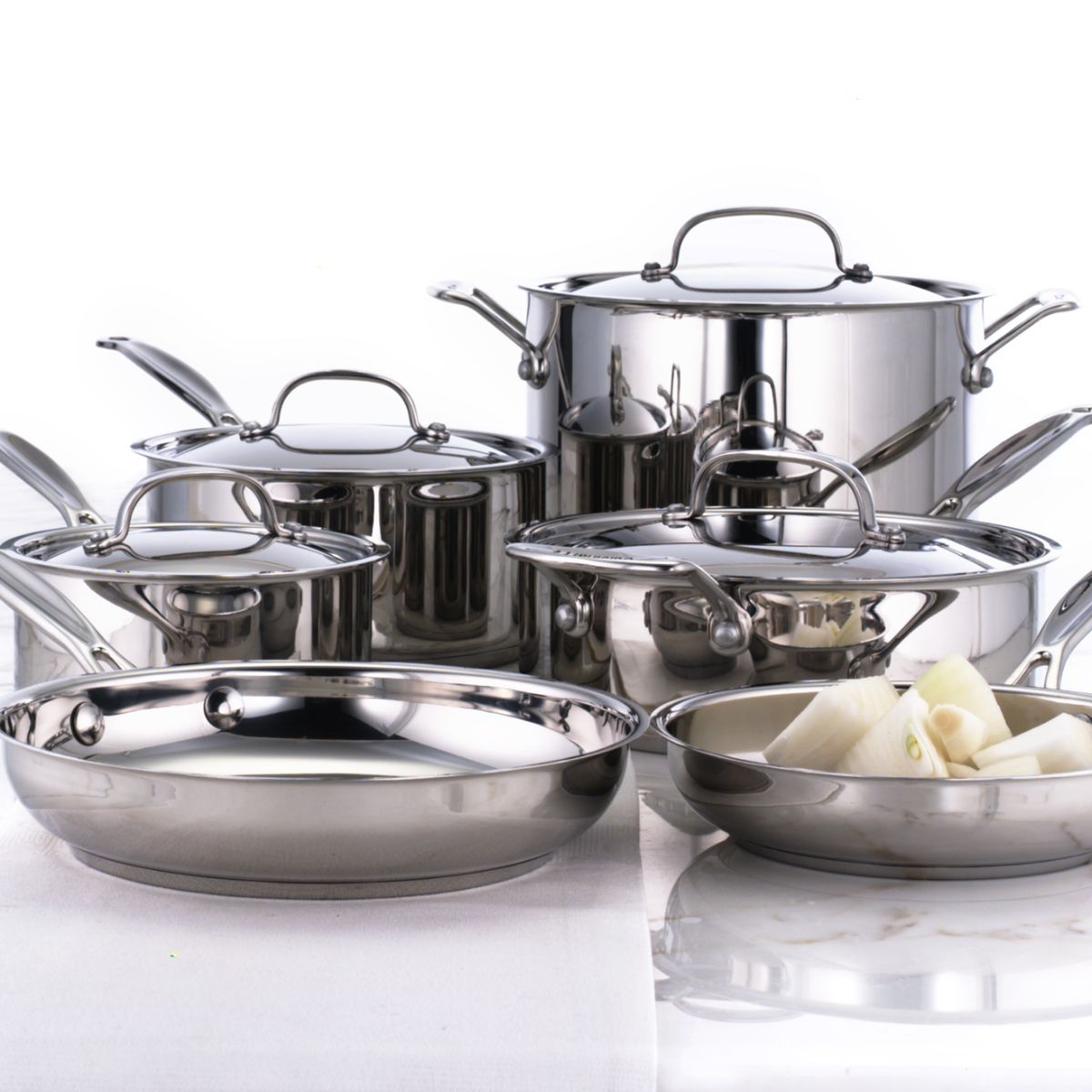 pots and pans on a white counter