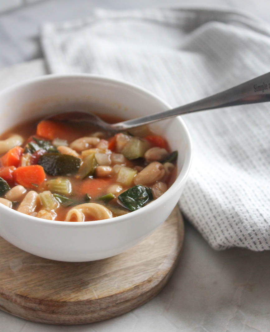 a picture of soup in a bowl with a spoon