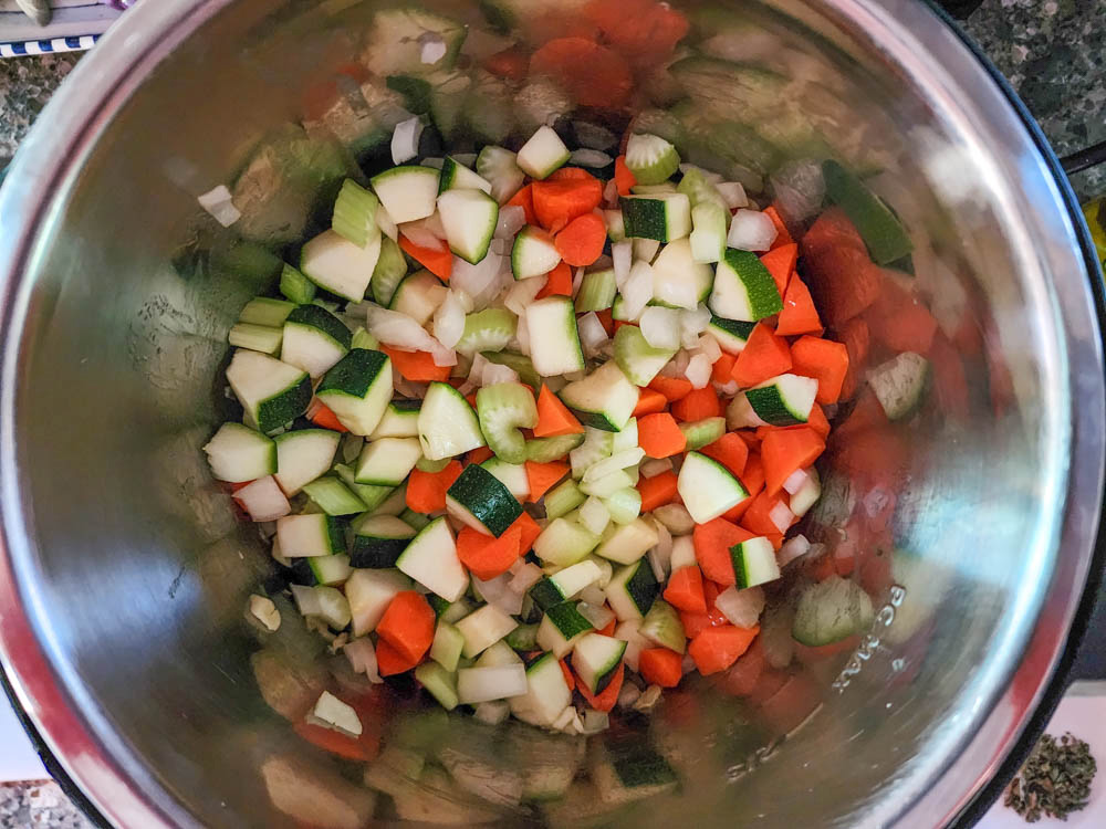 vegetables sauteeing in instant pot for soup