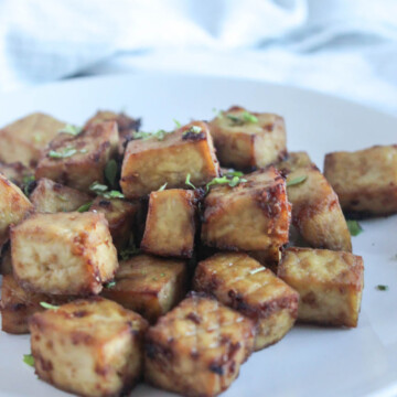 tofu bites on a white plate