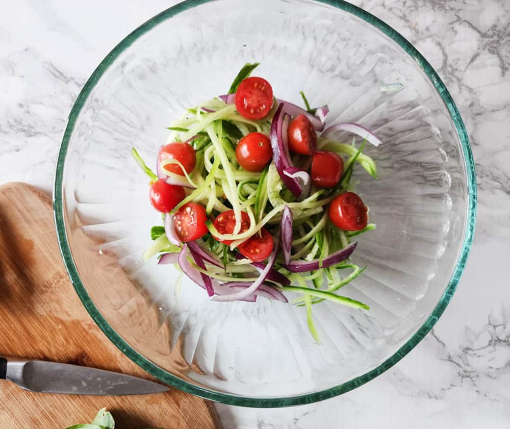 a picture of the salad ingredients in a bowl