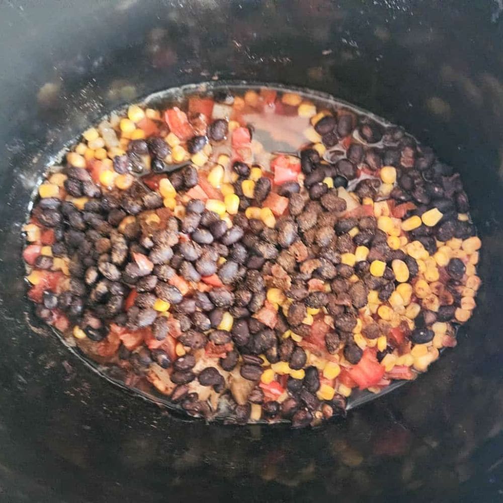 process step 3 cooked southwest chicken in a crockpot 