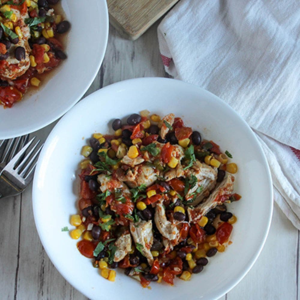 process step 4 shredded crockpot southwest chicken in a bowl