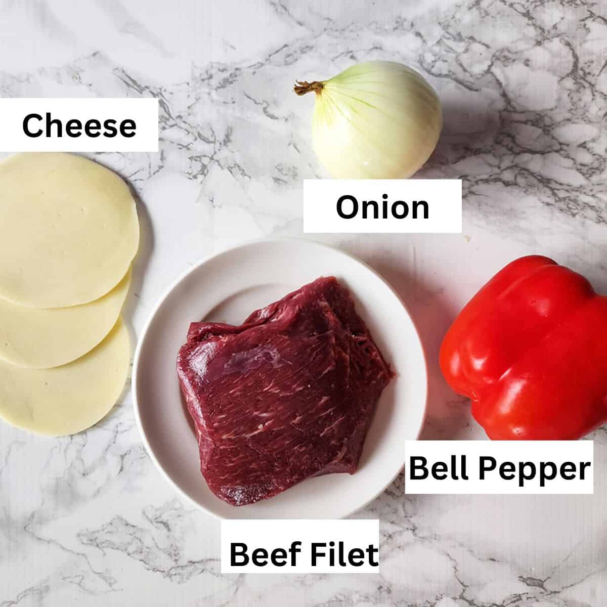 a picture of the ingredients needed to make a beef filet sandwich