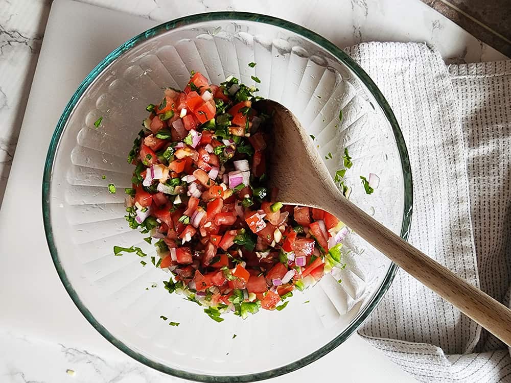 picture of pico de gallo mixed in a bowl