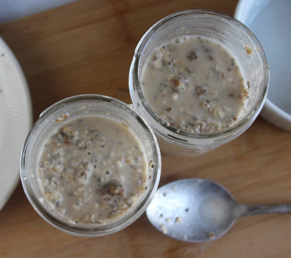 Overnight oats process step 2 a picture of liquid added to the jars 