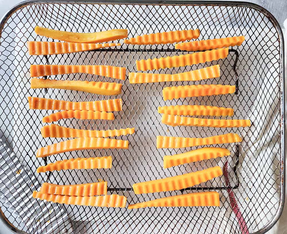 butternut squash fries on tray not cooked