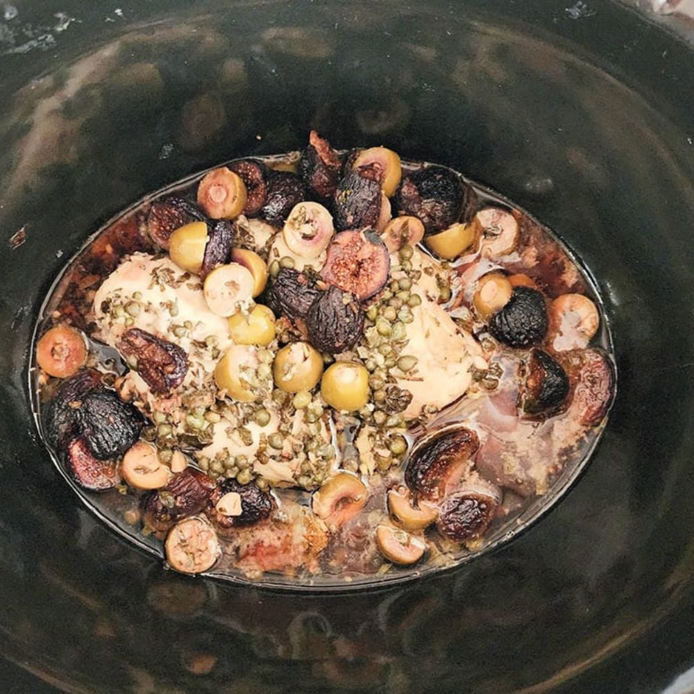 chicken marbella ingredients in a slow cooker