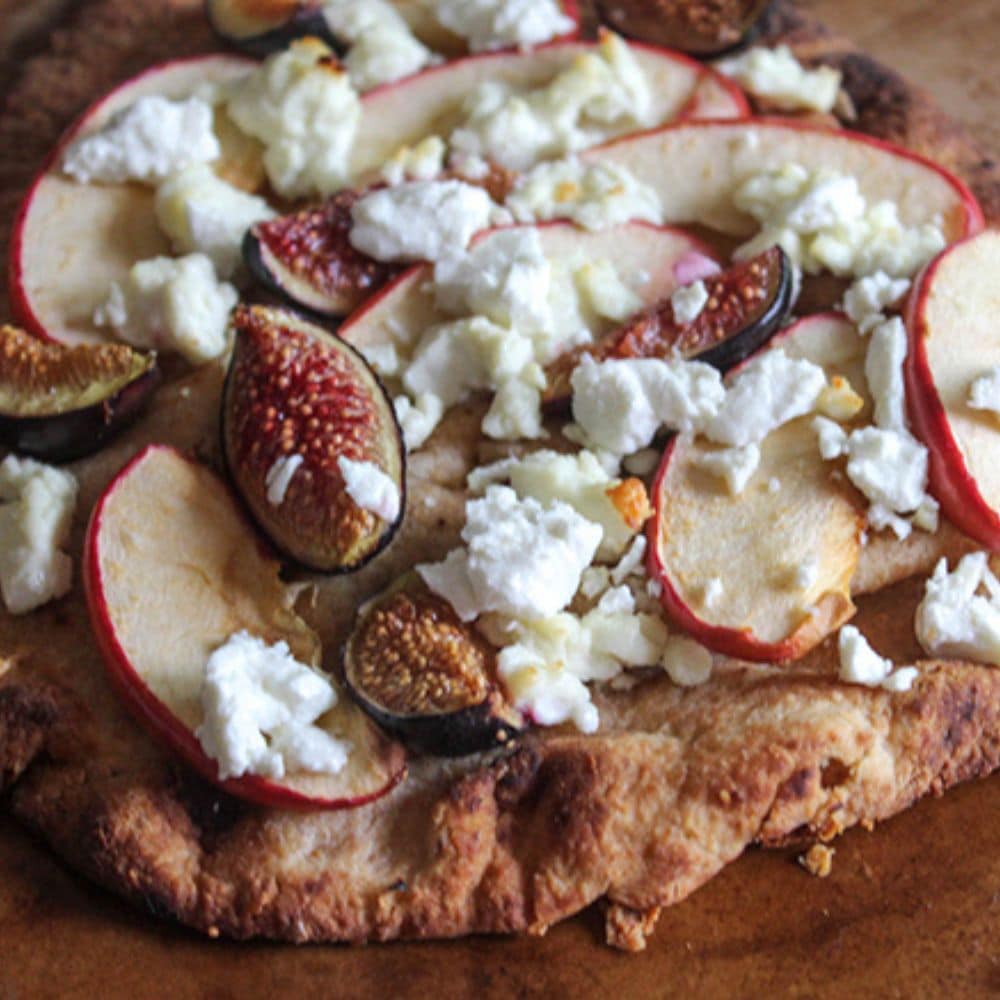 apple fig flatbread assembled and ready for the oven