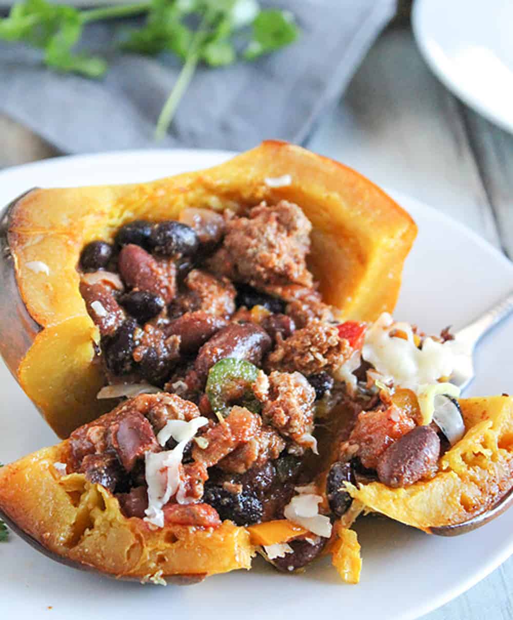 a picture of stuffed acorn squash on a plate