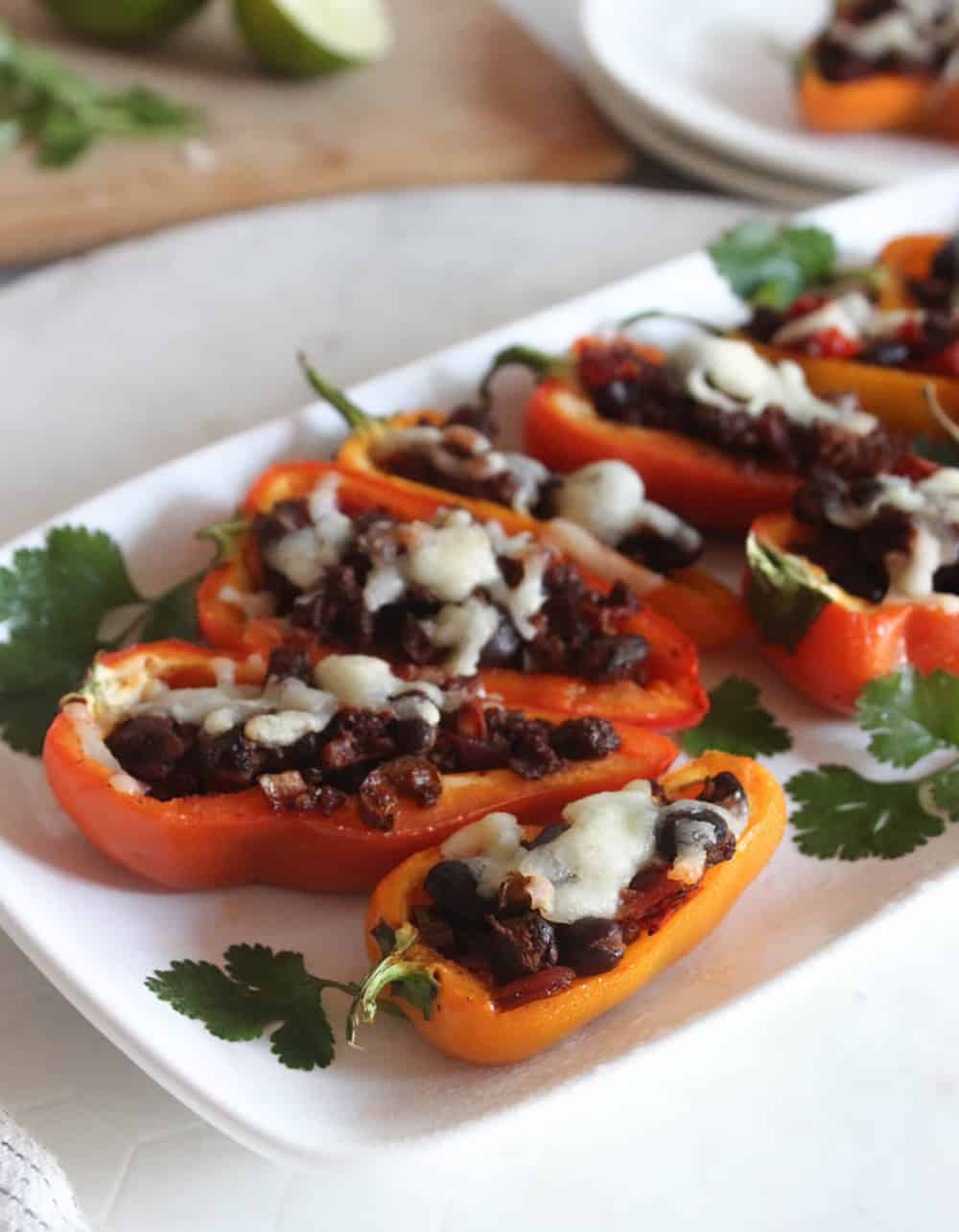 a close up of pepper nachos on a plate