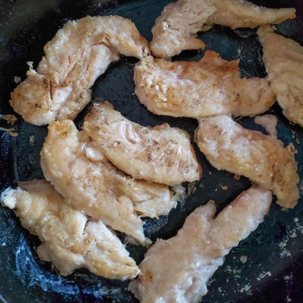 Orange chicken step 3 browning the chicken in a skillet