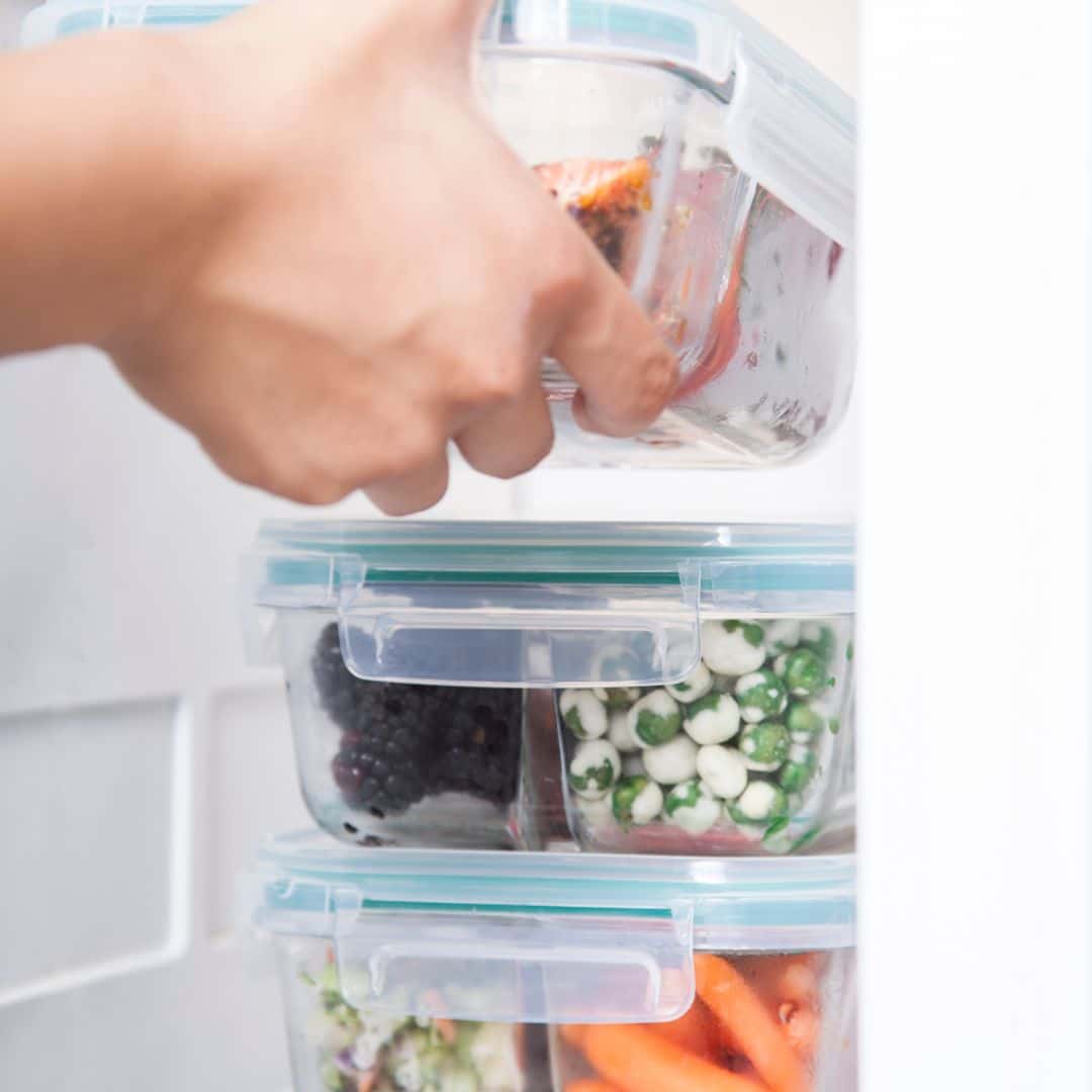 a picture of food storage containers in a fridge