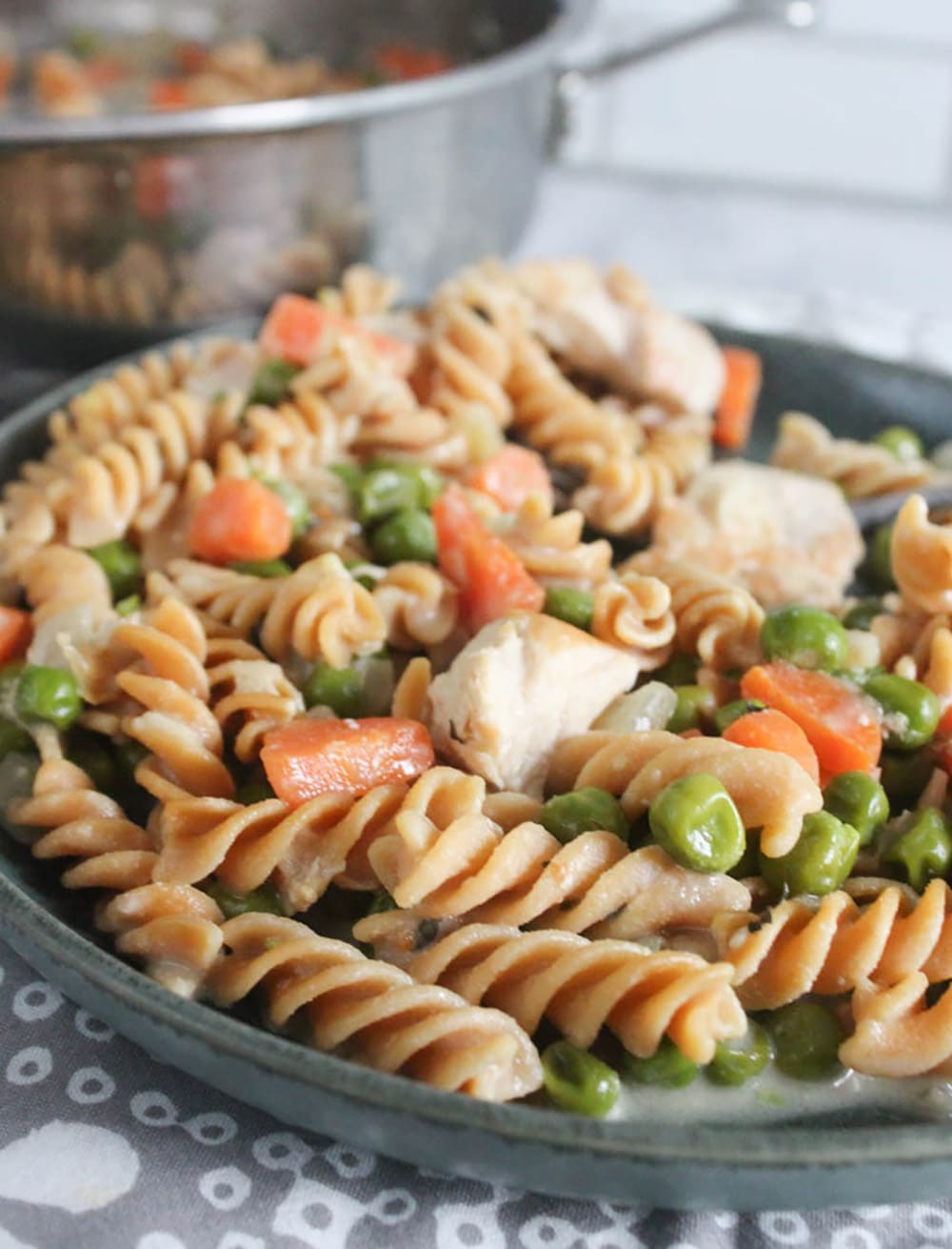 a close up picture of chicken pot pie pasta on a plate