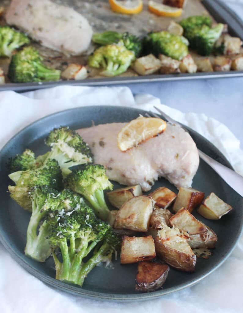 a picture of one serving of sheet pan chicken dinner on a plate