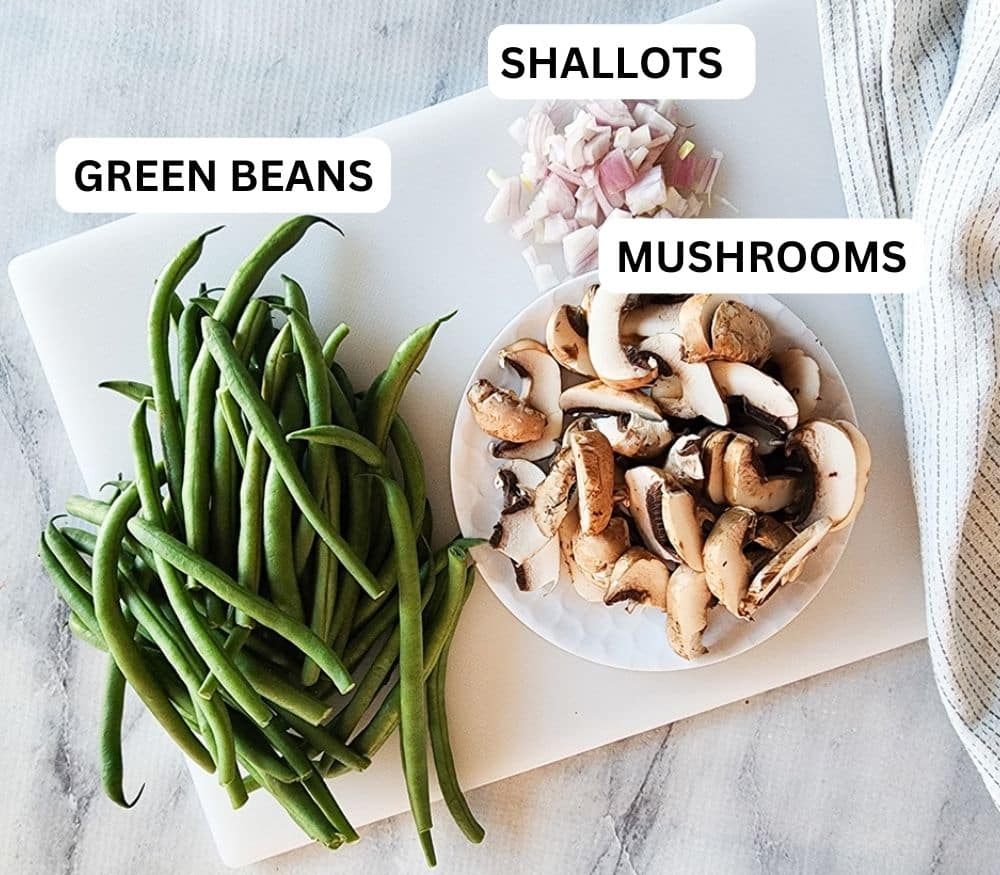 A picture of the ingredients needed to make this recipe: green beans, shallots, mushrooms