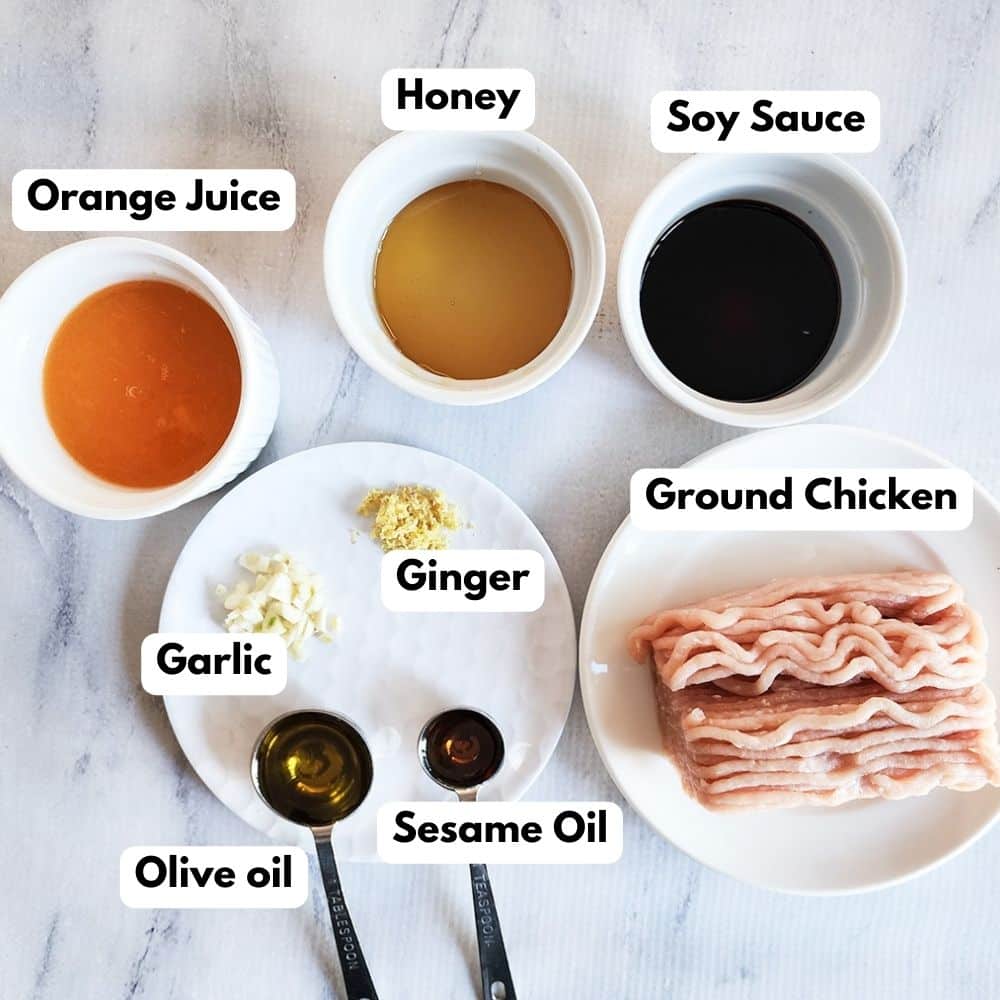 A picture of orange chicken ingredients on a marble slate