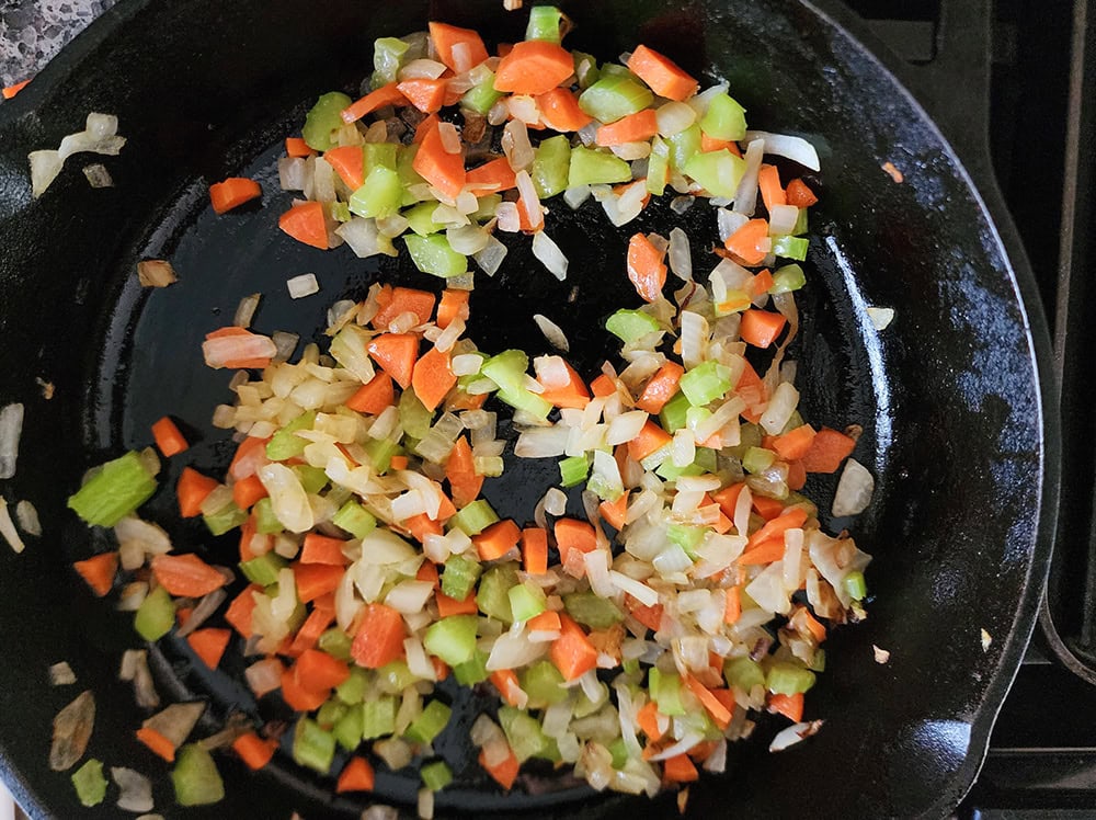 Process STEP 2: mirepoix cooking in a cast iron skillet