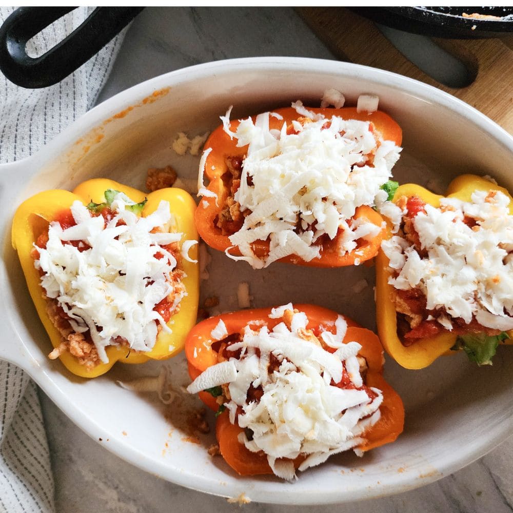 view looking down at stuffed peppers ready for the oven