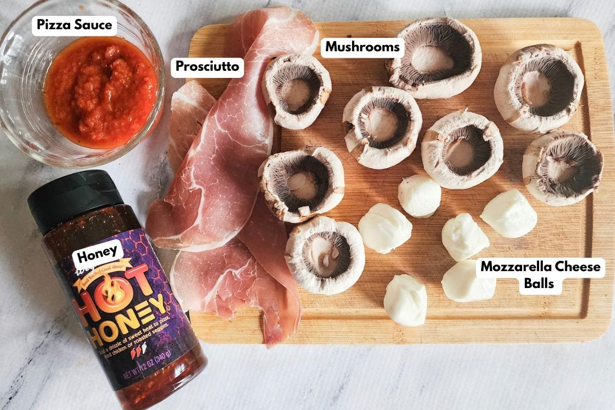 a picture of the ingredients needed to make pizza stuffed mushrooms